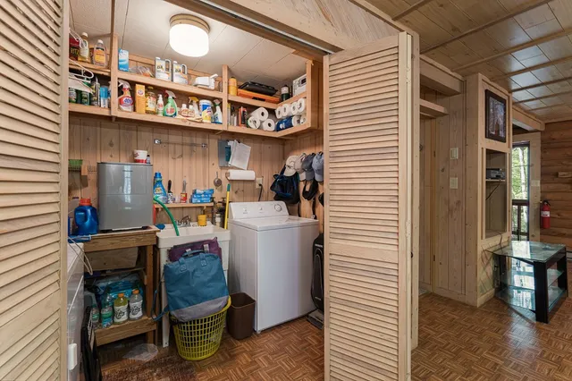 a view of balcony with wooden floor