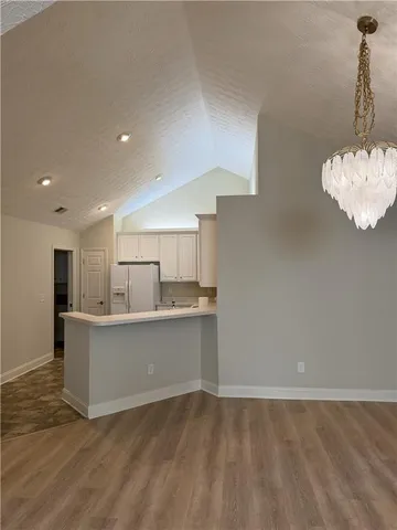 a view of kitchen sink and microwave