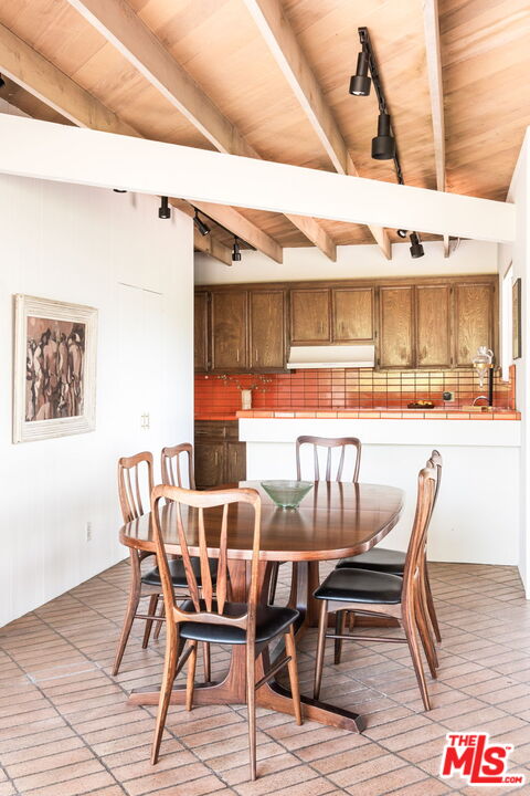 316 Redwood Drive Pasadena, CA 91105 - Photo 11 of 49 a dining area with furniture and wooden floor