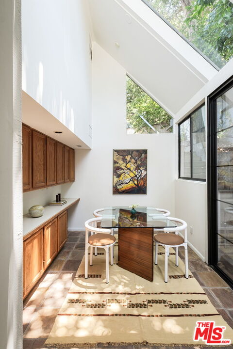 316 Redwood Drive Pasadena, CA 91105 - Photo 16 of 49 a kitchen with stainless steel appliances granite countertop a stove a sink and a microwave