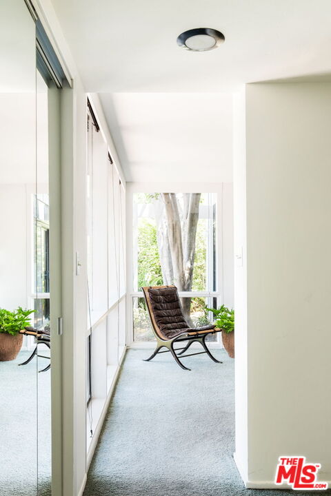 316 Redwood Drive Pasadena, CA 91105 - Photo 18 of 49 a balcony with chairs and couch