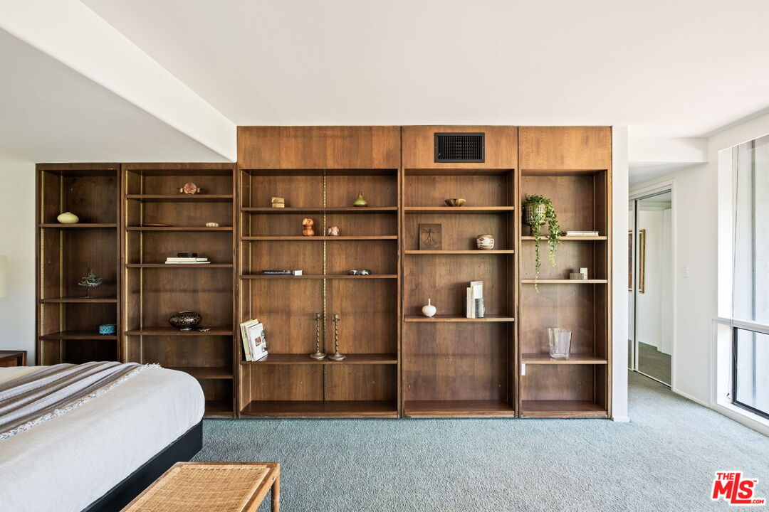 316 Redwood Drive Pasadena, CA 91105 - Photo 22 of 49 a living room with a bed and walk in closet
