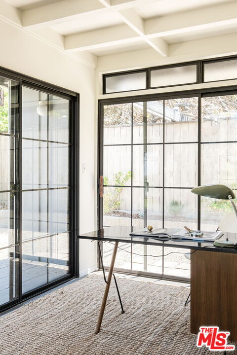 316 Redwood Drive Pasadena, CA 91105 - Photo 27 of 49 a living room with a floor to ceiling window and wooden floor