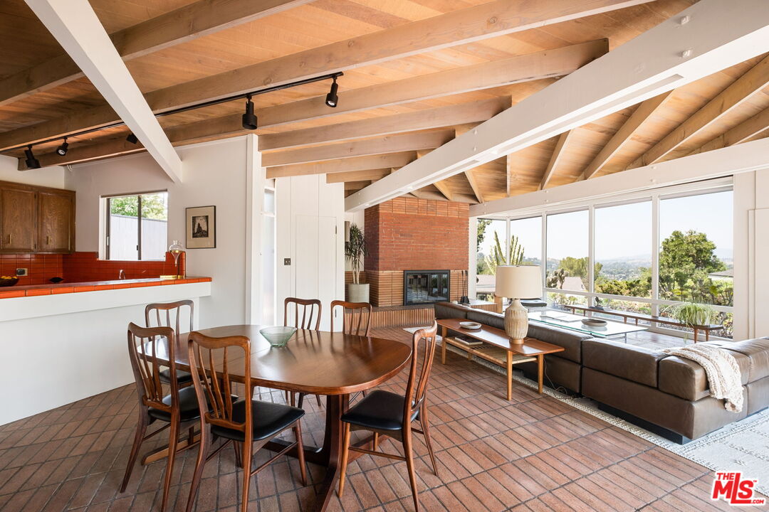 316 Redwood Drive Pasadena, CA 91105 - Photo 3 of 49 a view of a dining room with furniture window and wooden floor