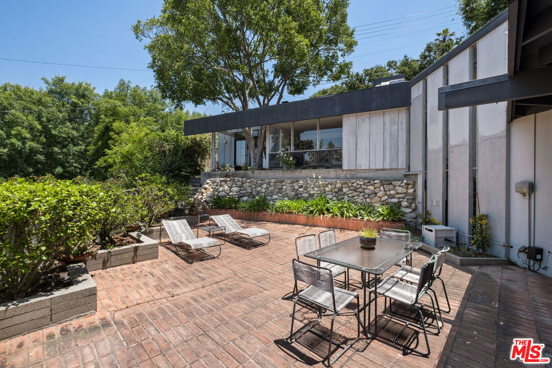 316 Redwood Drive Pasadena, CA 91105 - Photo 40 of 49 a view of backyard with outdoor seating and plants