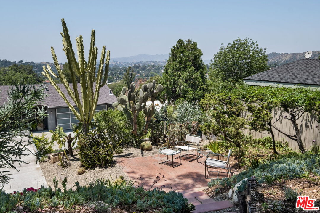 316 Redwood Drive Pasadena, CA 91105 - Photo 41 of 49 a view of a backyard with a garden
