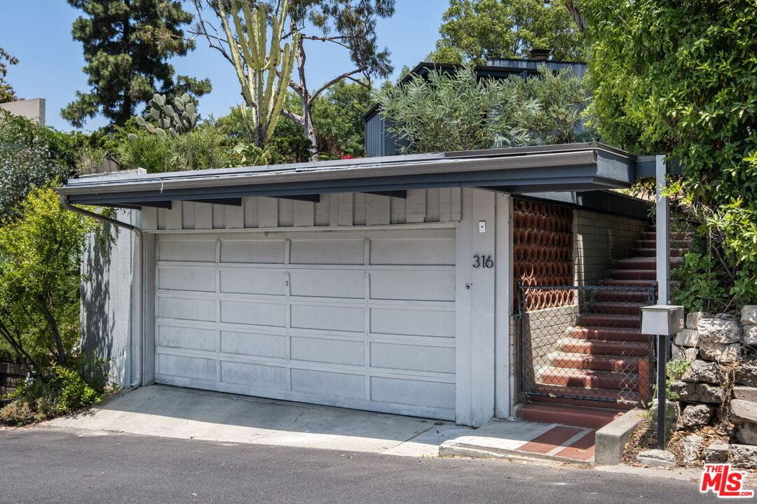 316 Redwood Drive Pasadena, CA 91105 - Photo 46 of 49 a view of a house with a backyard