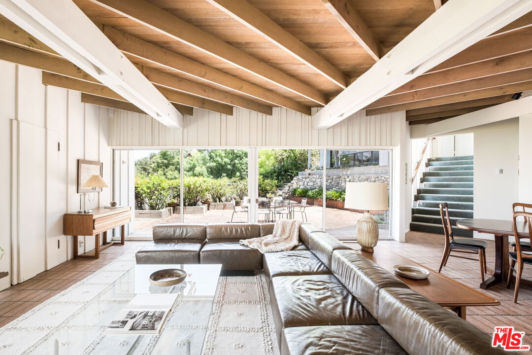 316 Redwood Drive Pasadena, CA 91105 - Photo 7 of 49 a living room with furniture and a large window