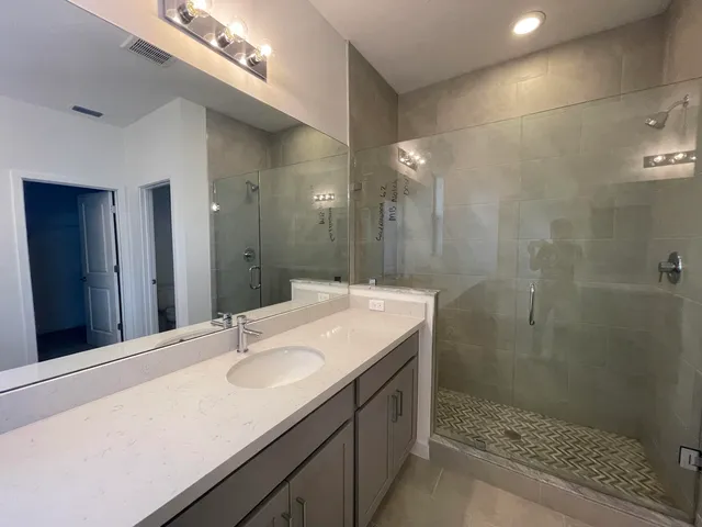 a view of a hallway with closet area