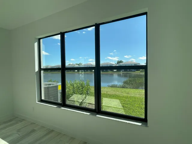 a house that has a yard in front of it