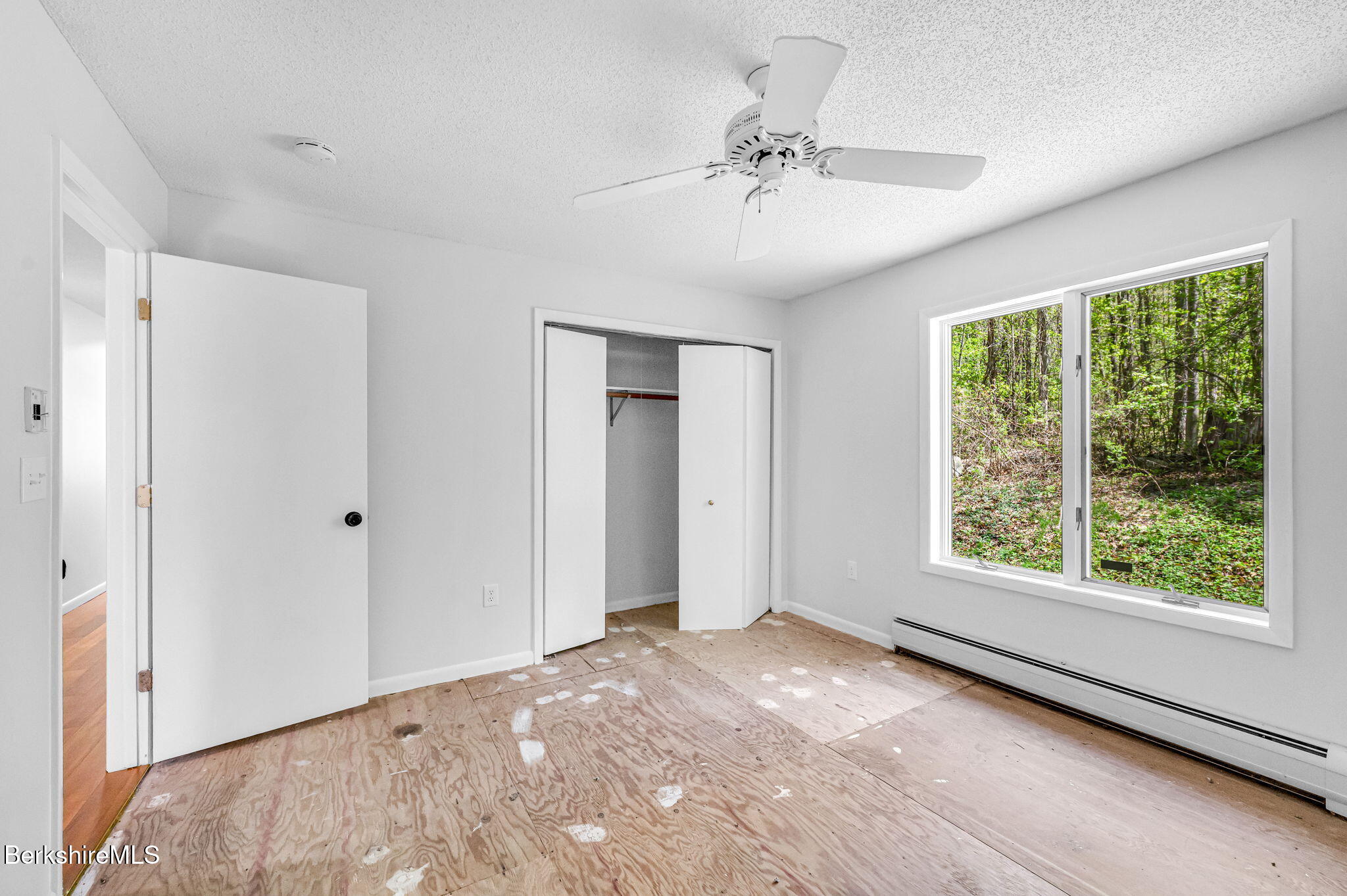 1874 Home Road Sheffield, MA 01230 - Photo 30 of 42 a view of an empty room with a window