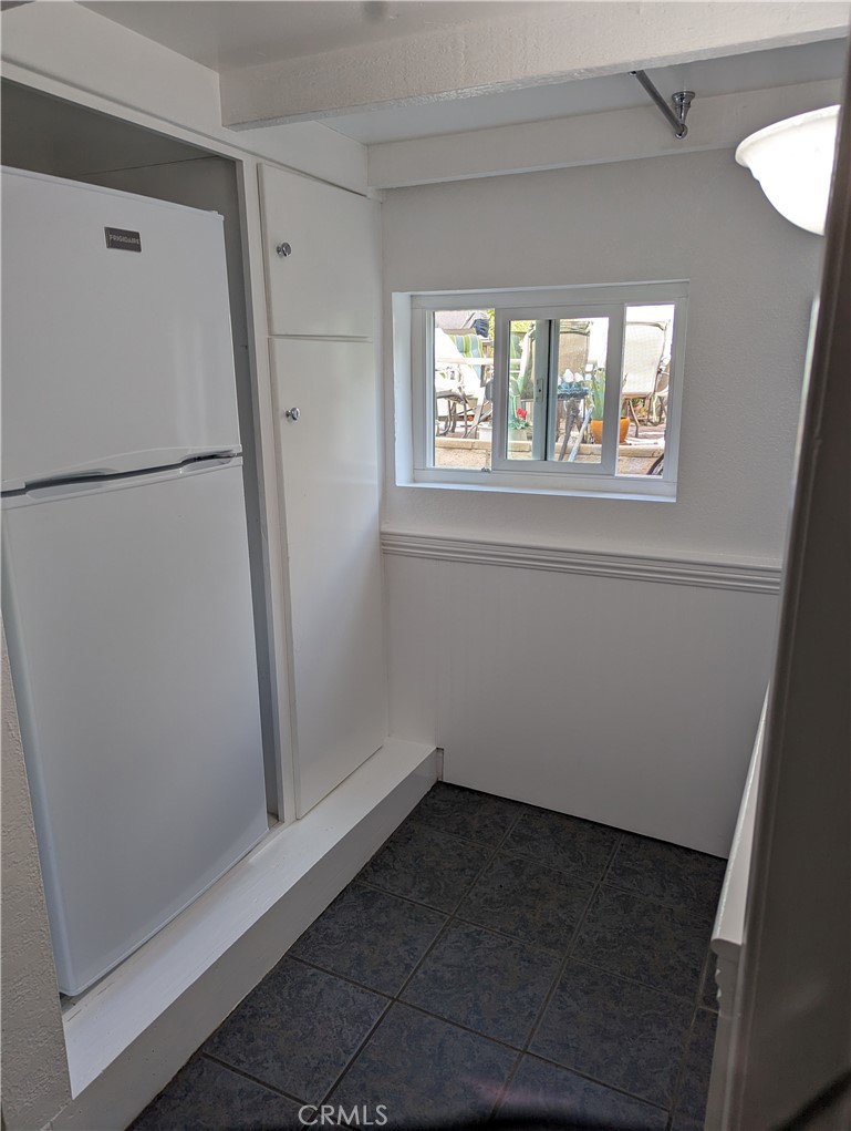 725 Box Canyon Road West Hills, CA 91304 - Photo 11 of 20 a view of utility room with a window