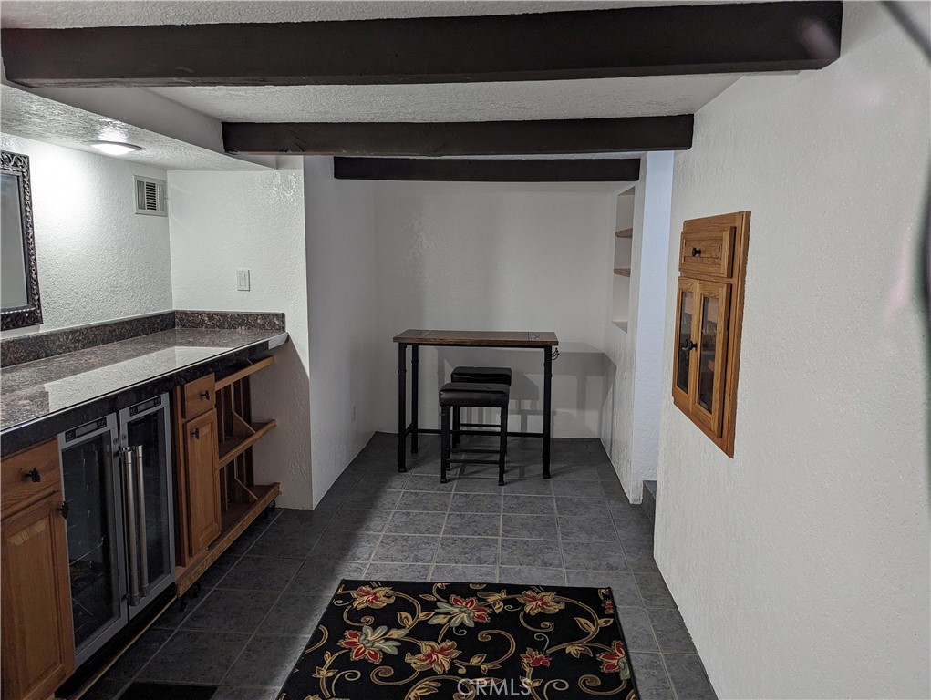 725 Box Canyon Road West Hills, CA 91304 - Photo 3 of 20 a hallway with furniture and wooden floor