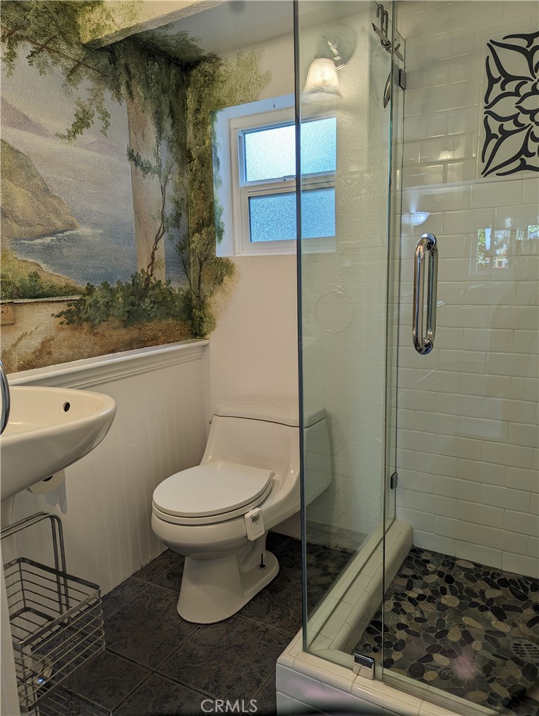 725 Box Canyon Road West Hills, CA 91304 - Photo 4 of 20 a bathroom with a toilet and a shower