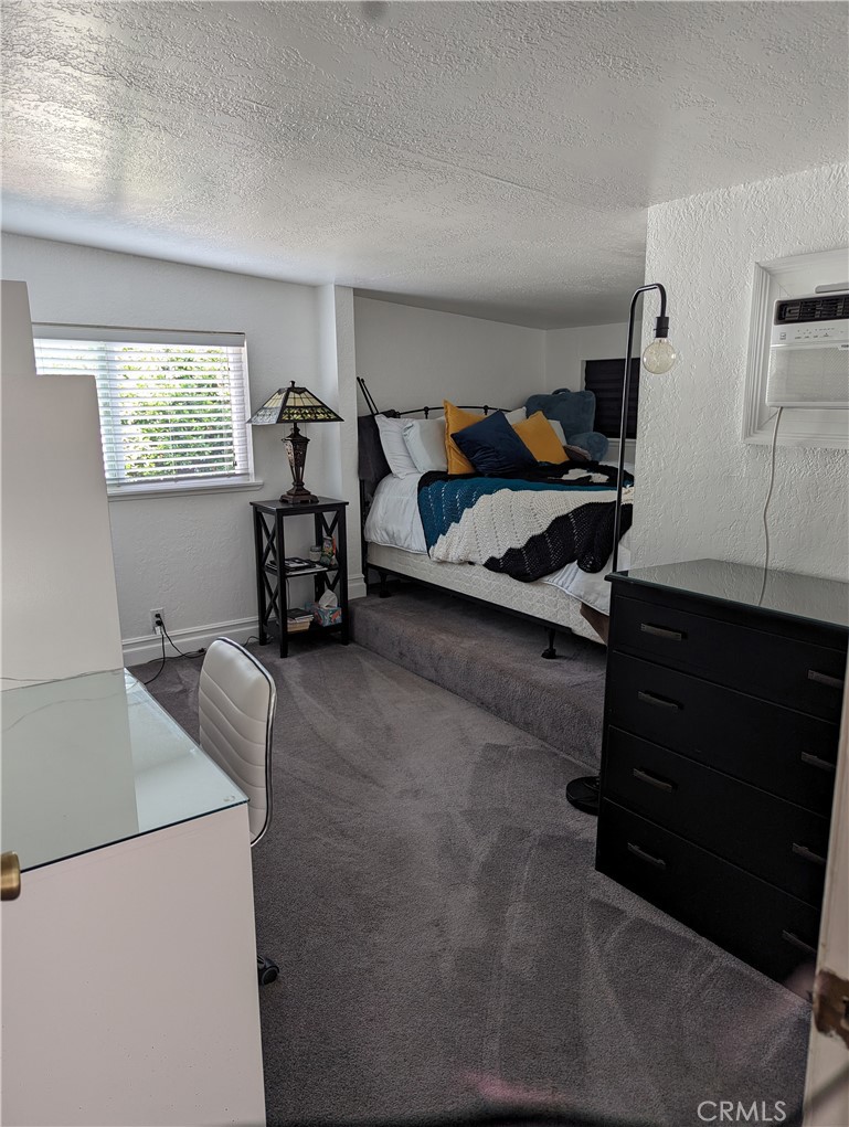 725 Box Canyon Road West Hills, CA 91304 - Photo 8 of 20 a bedroom with furniture and a window