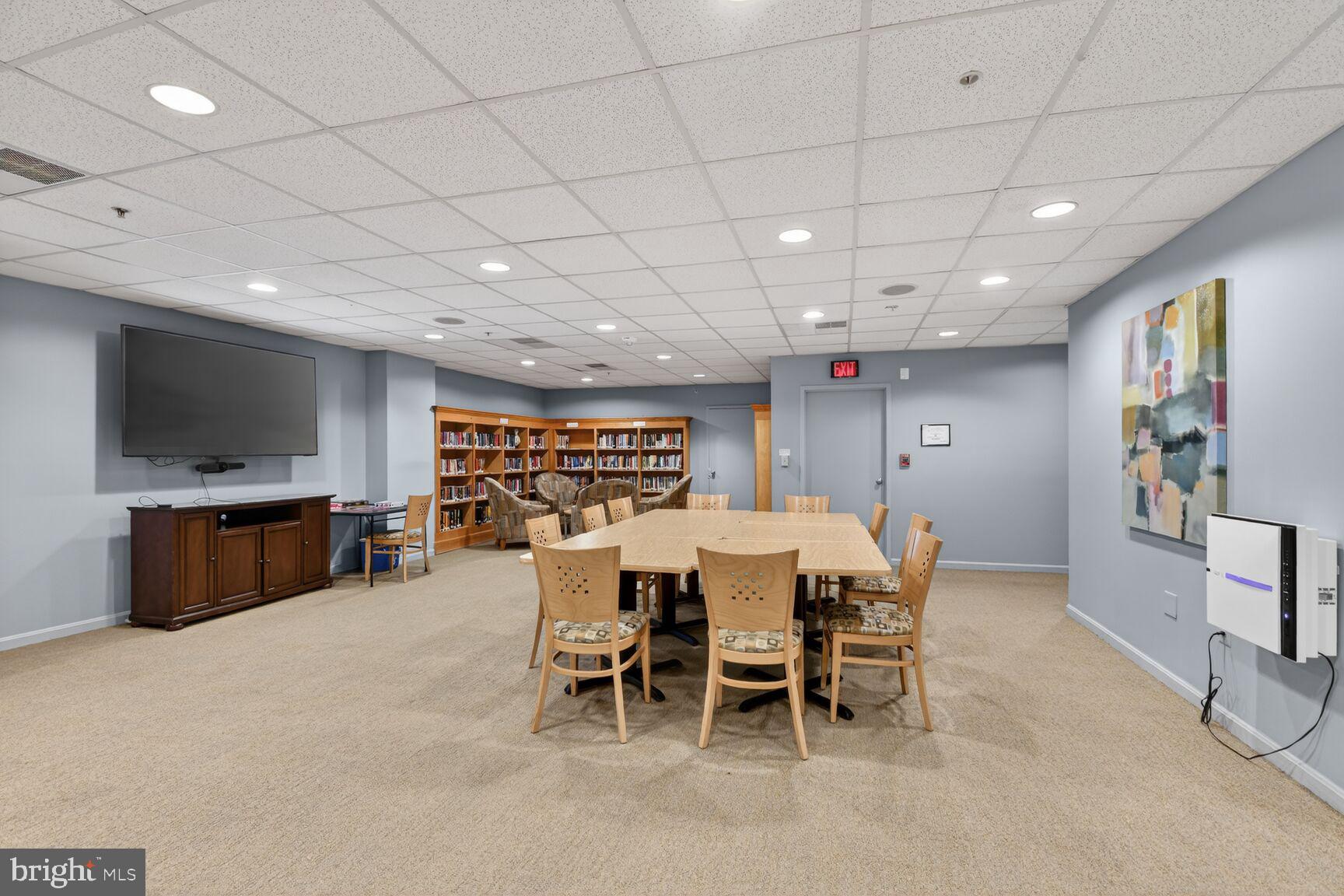 15115 Interlachen Drive, Unit 3904 Silver Spring, MD 20906 - Photo 27 of 43 a view of a dining room with furniture
