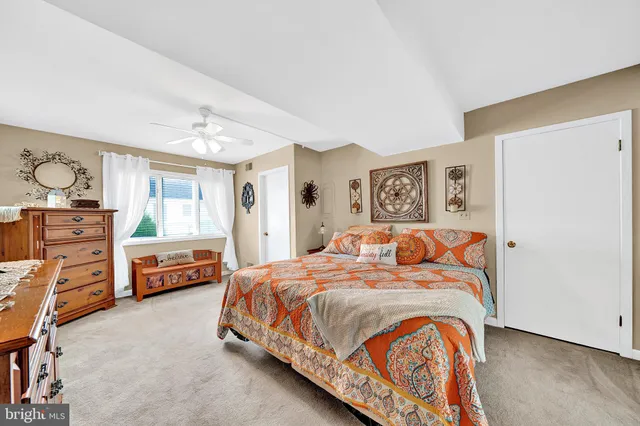 a bedroom with a bed and furniture