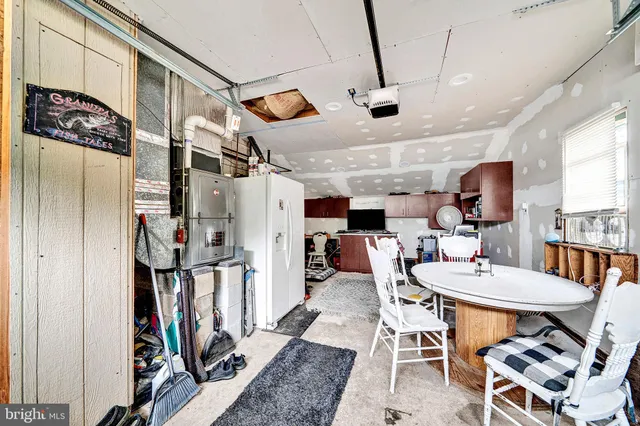 a outdoor living space with furniture and a potted plant