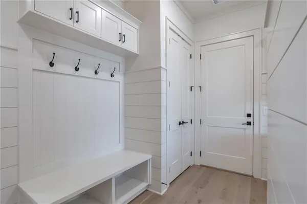 a bathroom with a sink a toilet and bathtub