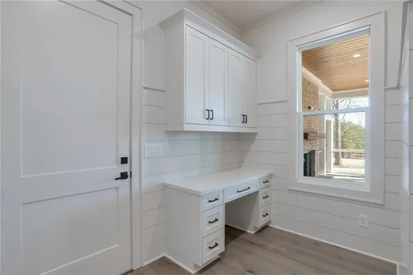 a view of a hallway with a livingroom