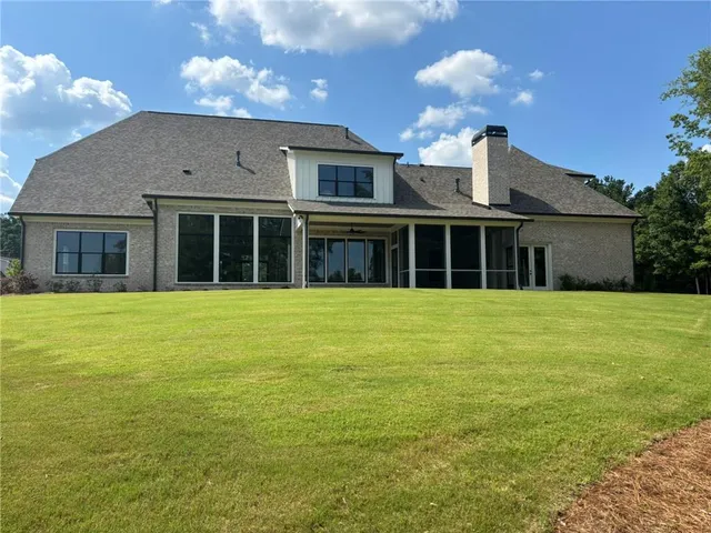 a house with garden in front of it