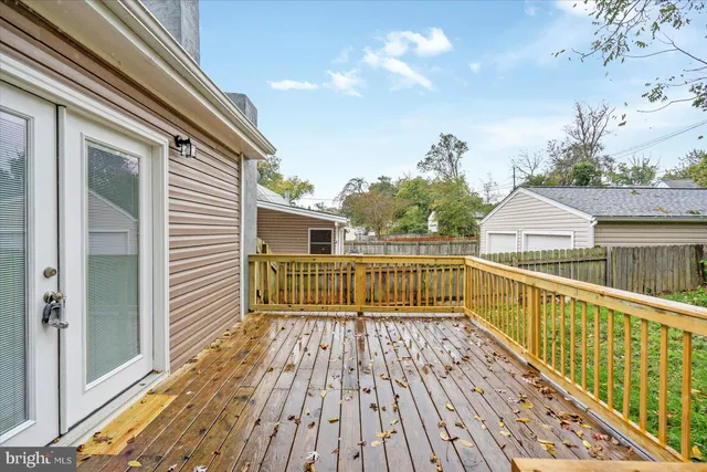 a view of balcony with wooden floor