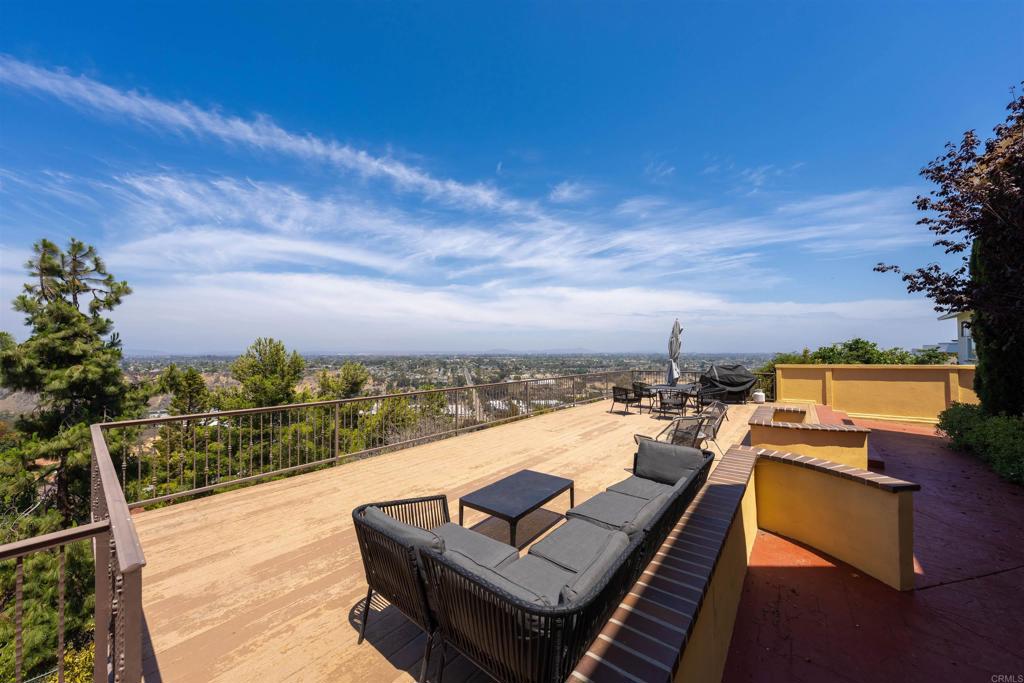 5765 Soledad Mountain Road La Jolla, CA 92037 - Photo 18 of 22 a view of a terrace with couches and city view