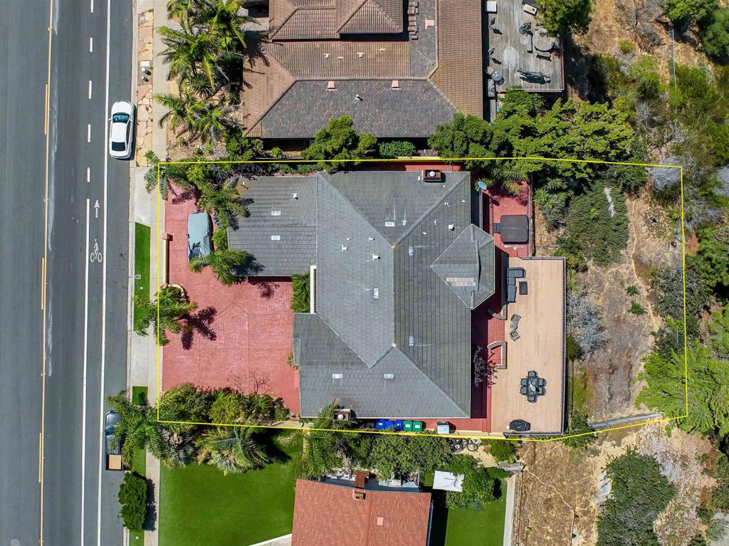 5765 Soledad Mountain Road La Jolla, CA 92037 - Photo 22 of 22 an aerial view of a house with a yard and garden