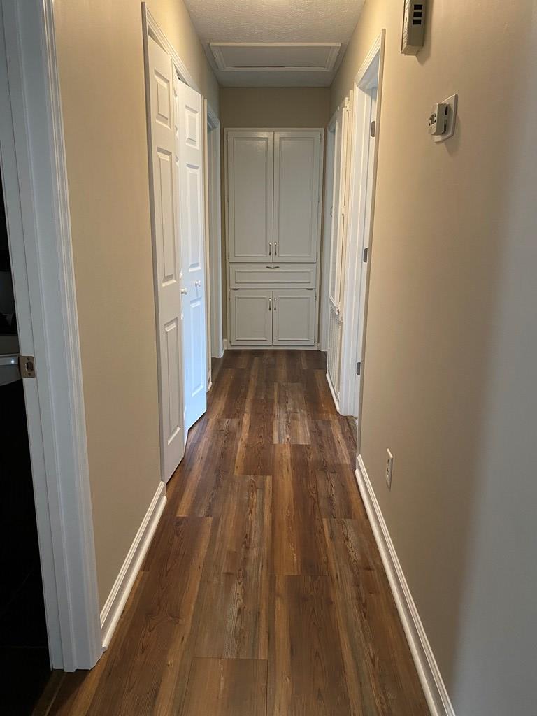 3 Deland Court Columbus, GA 31904 - Photo 14 of 27 a view of a hallway with wooden floor