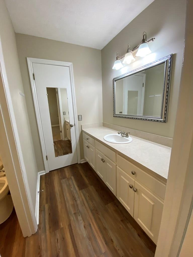 3 Deland Court Columbus, GA 31904 - Photo 20 of 27 a bathroom with a double vanity sink and mirror