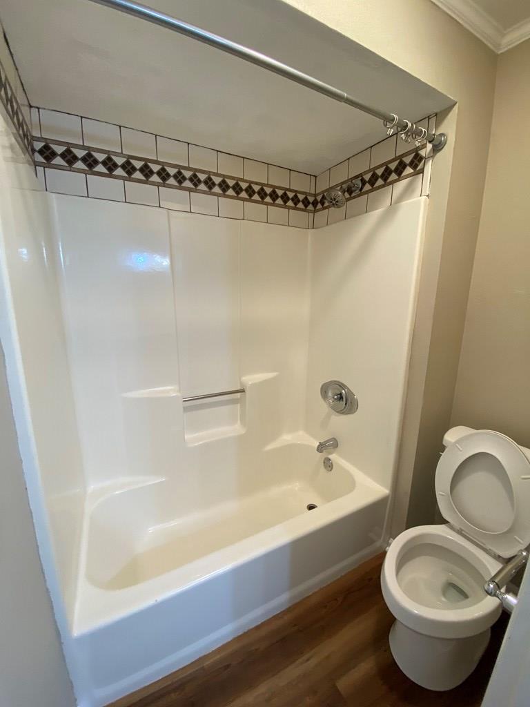 3 Deland Court Columbus, GA 31904 - Photo 21 of 27 a bathroom with a tub and a shower