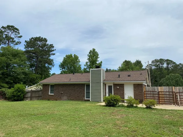 a view of a yard in front of a house