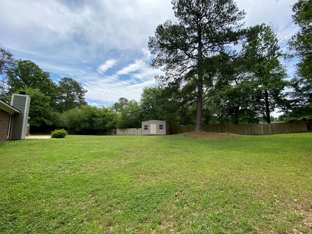 a fire hydrant in the middle of a field