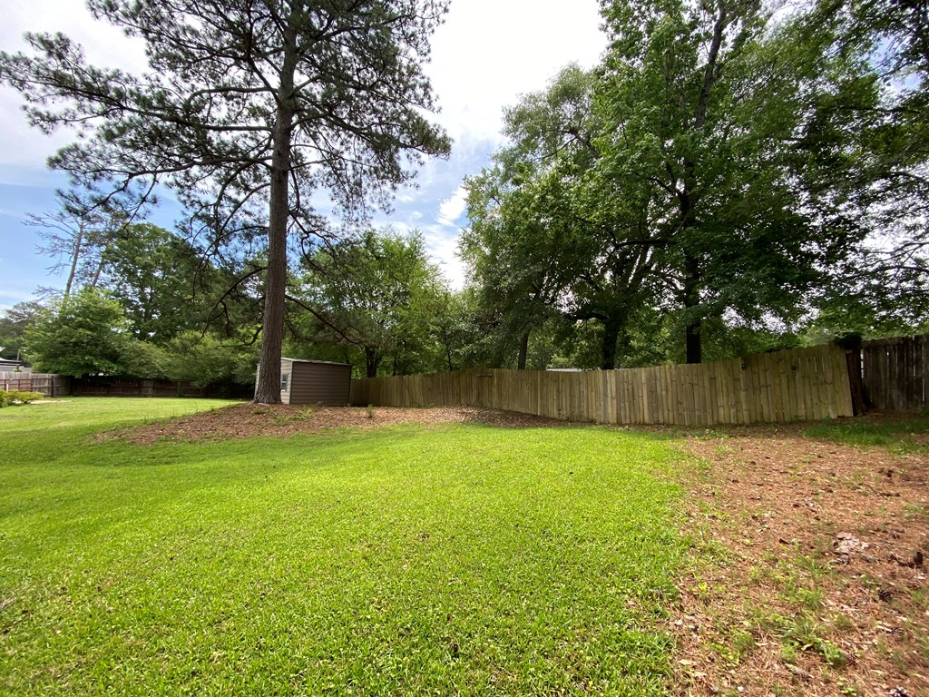 3 Deland Court Columbus, GA 31904 - Photo 25 of 27 a swimming pool with wooden fence