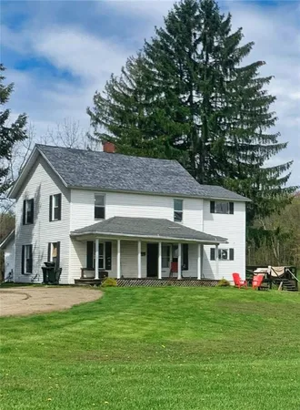 a view of a house with a large gate