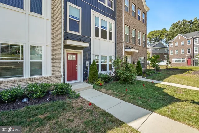 a view of a building with a yard