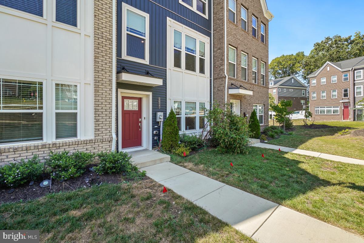 3027 Coriander Place Bryans Road, MD 20616 - Photo 2 of 29 a view of a building with a yard