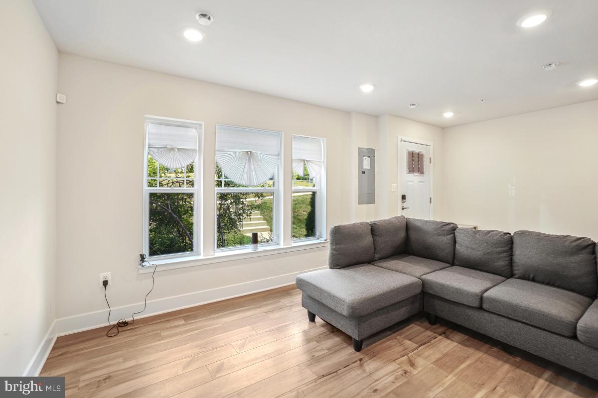 3027 Coriander Place Bryans Road, MD 20616 - Photo 4 of 29 a living room with furniture and a large window