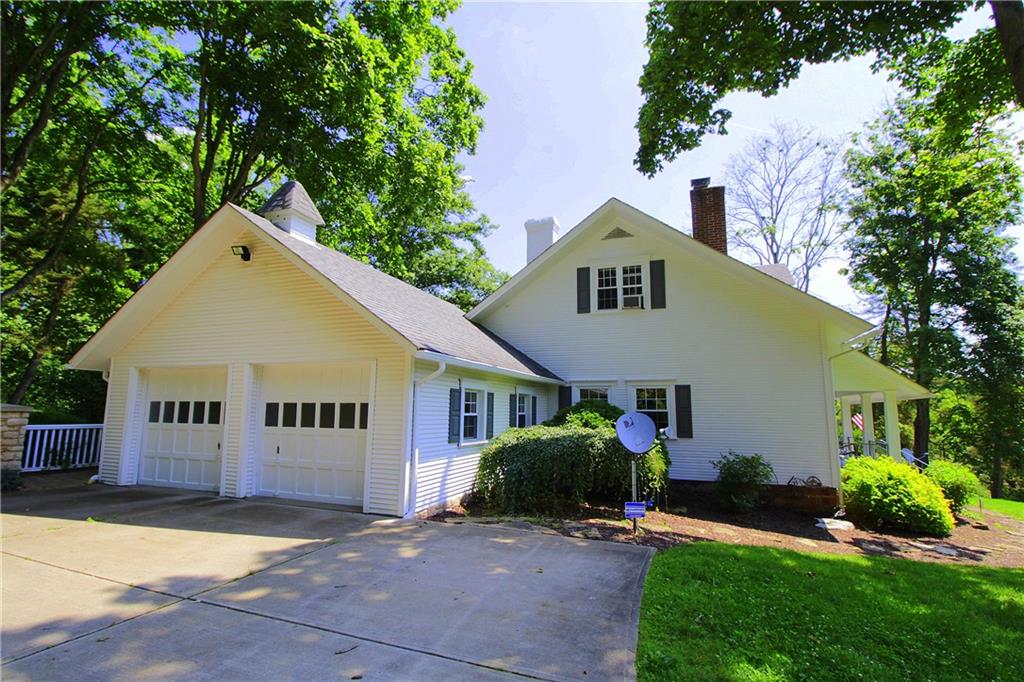 163 Sugar Run Road Eighty Four, PA 15330 - Photo 2 of 25 Driveway and side of home