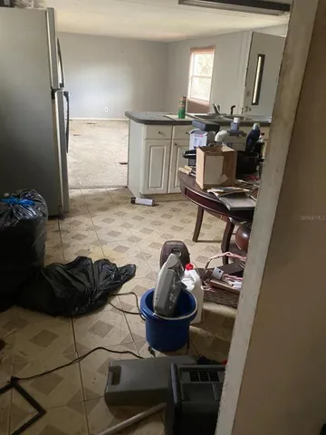 a room with furniture and a mirror