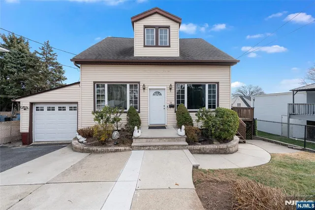 a front view of house with yard