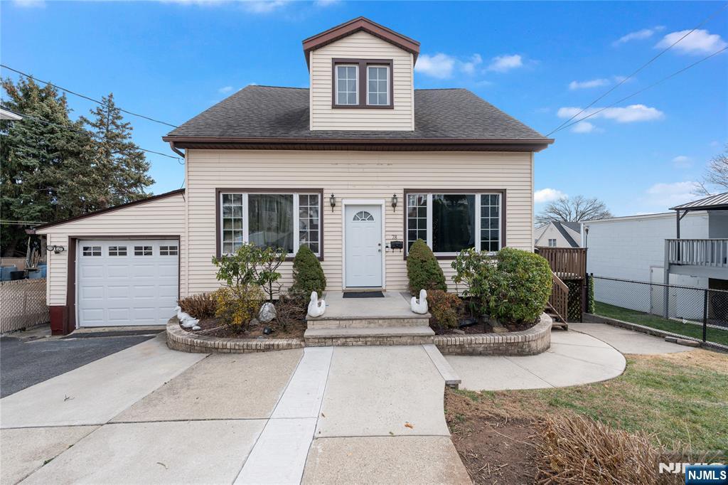 a front view of house with yard