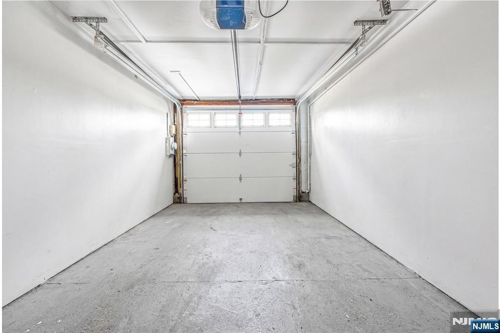 78 Columbia Street Wood-Ridge, NJ 07075 - Photo 18 of 25 a view of a room with window and chandelier