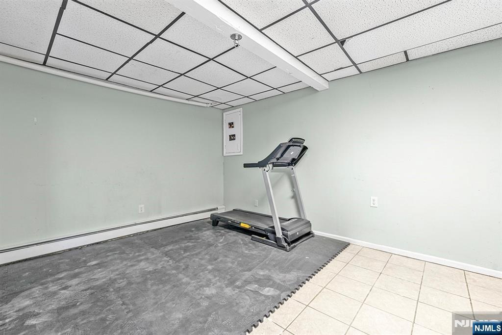 78 Columbia Street Wood-Ridge, NJ 07075 - Photo 22 of 25 a room with gym equipment