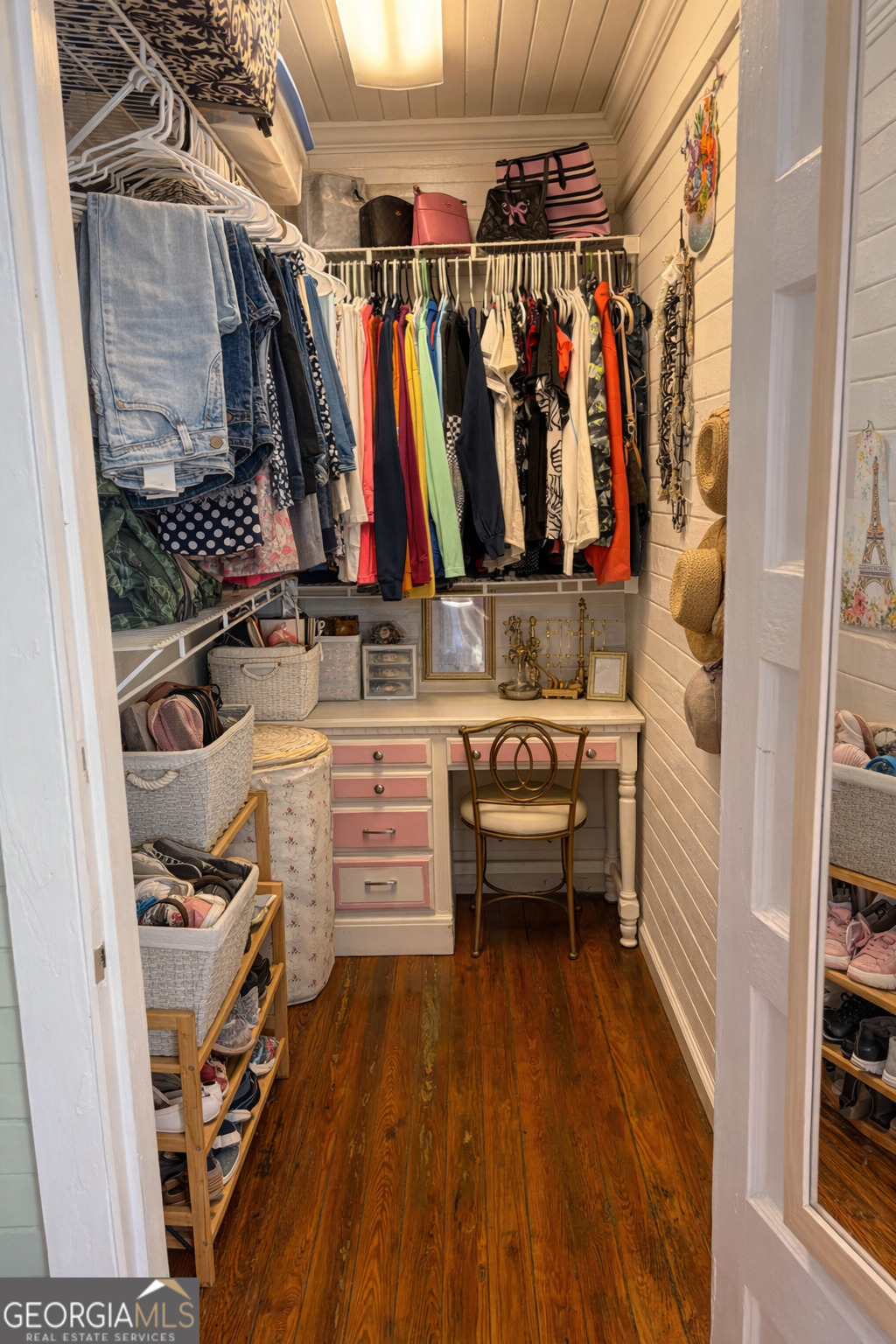223 Holt Street Thomson, GA 30824 - Photo 11 of 24 a view of walk in closet with clothes and shoes