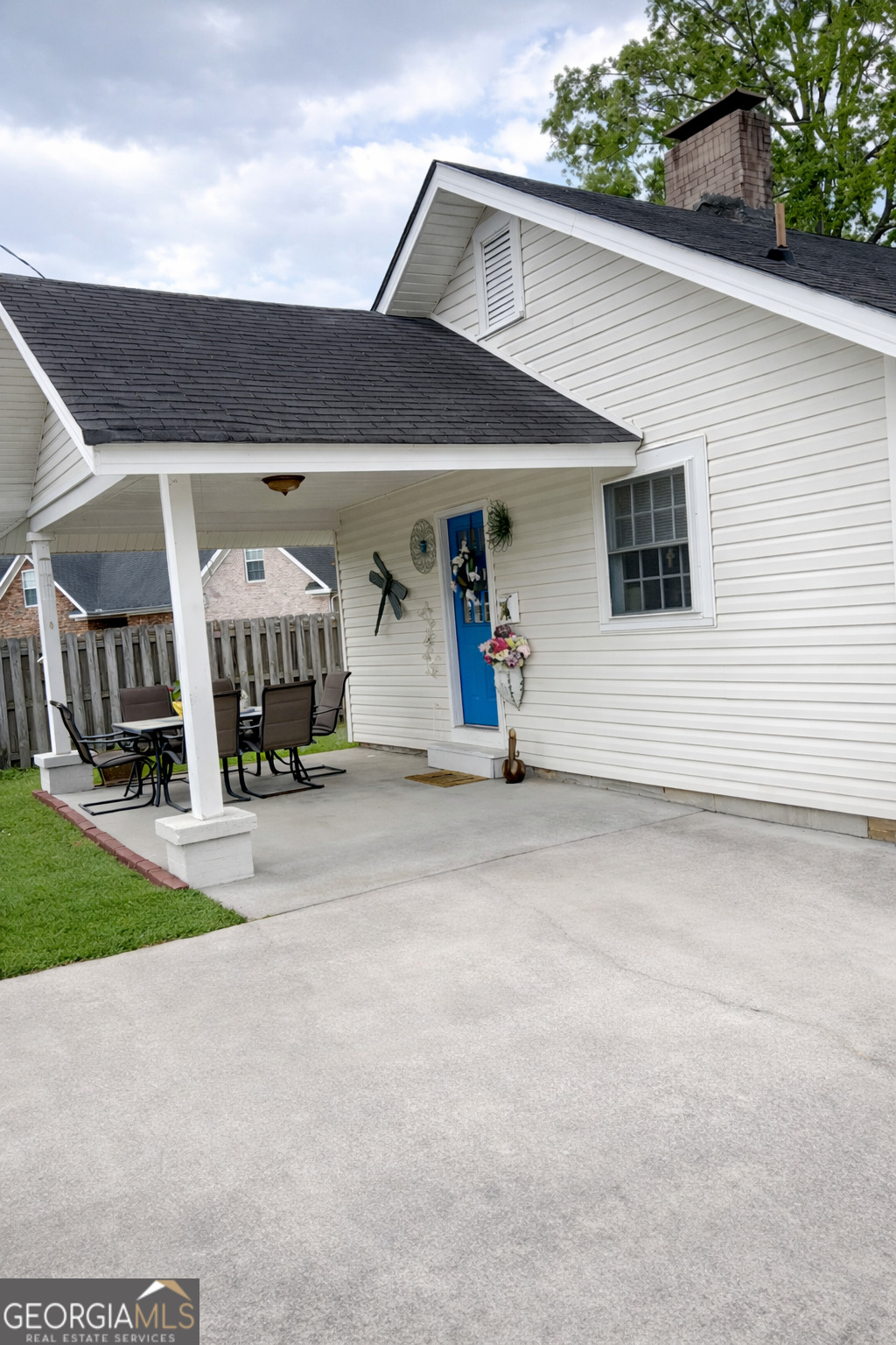 223 Holt Street Thomson, GA 30824 - Photo 4 of 24 a view of garage and deck