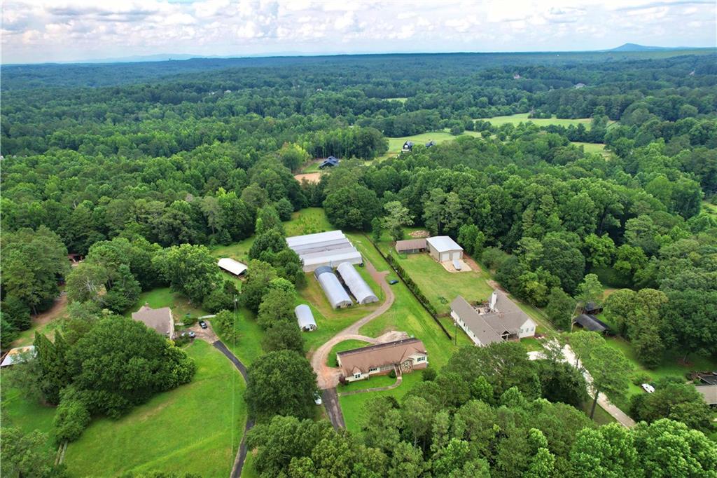 1930 Redd Road Milton, GA 30004 - Photo 1 of 1 an aerial view of a house with a yard