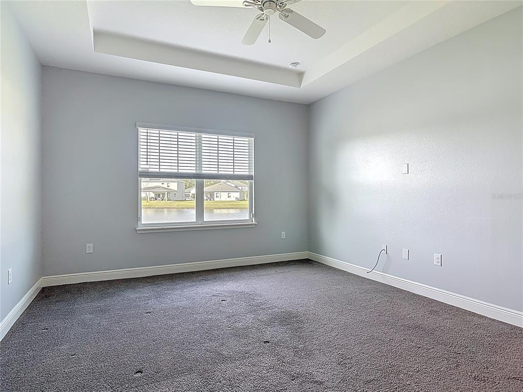 5644 Estero Loop Port Orange, FL 32128 - Photo 17 of 50 an empty room with a window