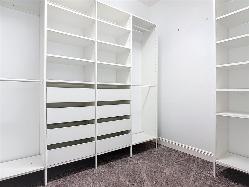 5644 Estero Loop Port Orange, FL 32128 - Photo 19 of 50 a view of an empty room with empty racks