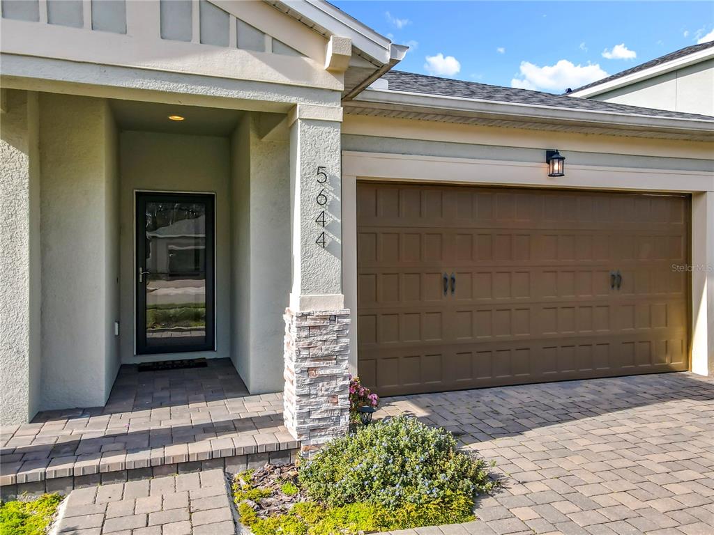 5644 Estero Loop Port Orange, FL 32128 - Photo 2 of 50 a front view of a house